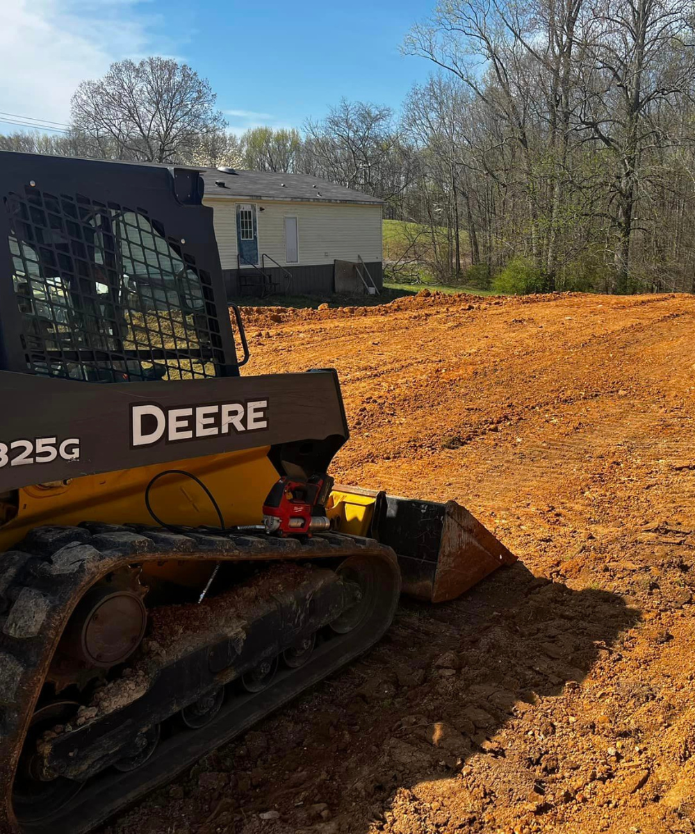 professional land clearing & excavating ardmore al being done on a property